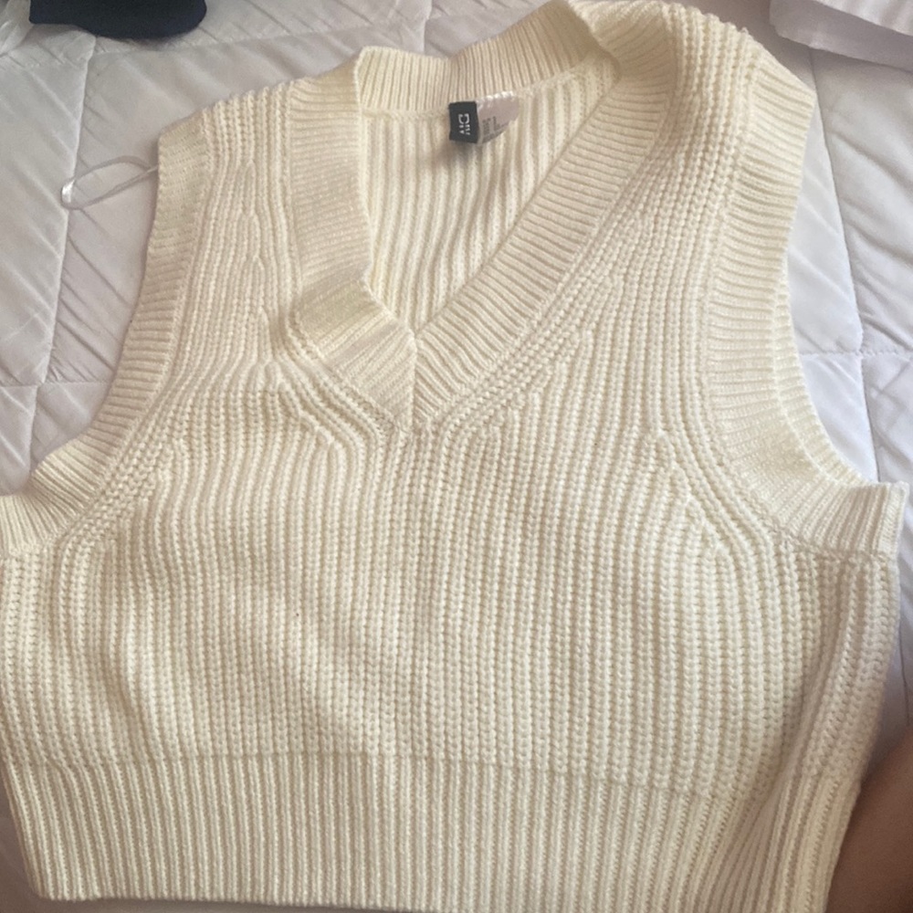 beige vest